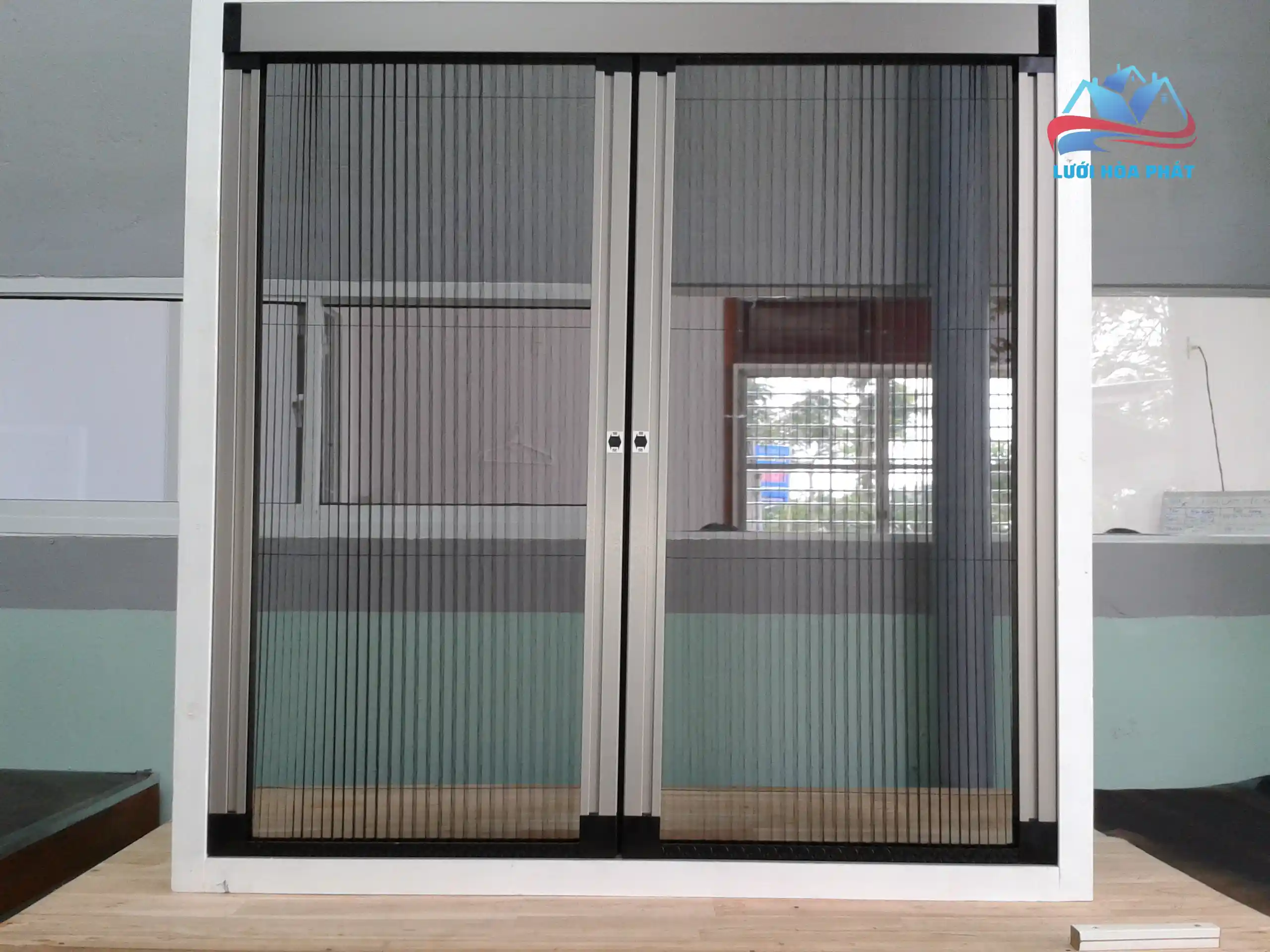 giá cửa lưới chống muỗi dạng cuốn tại luoihoaphat.vn
