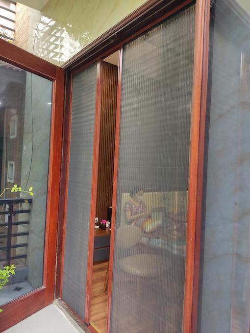 cửa lưới chống muỗi dạng xếp 2 cánh vân gỗ DX 07
